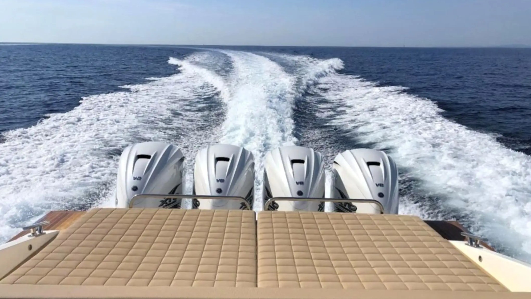 51' Capelli yacht four V6 outboard engines leaving a wake trail in Miami Beach