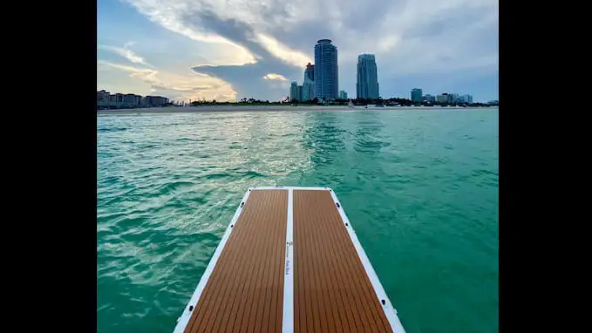 51' SeaRay yacht inflatable swim platform attached at stern in Miami Beach