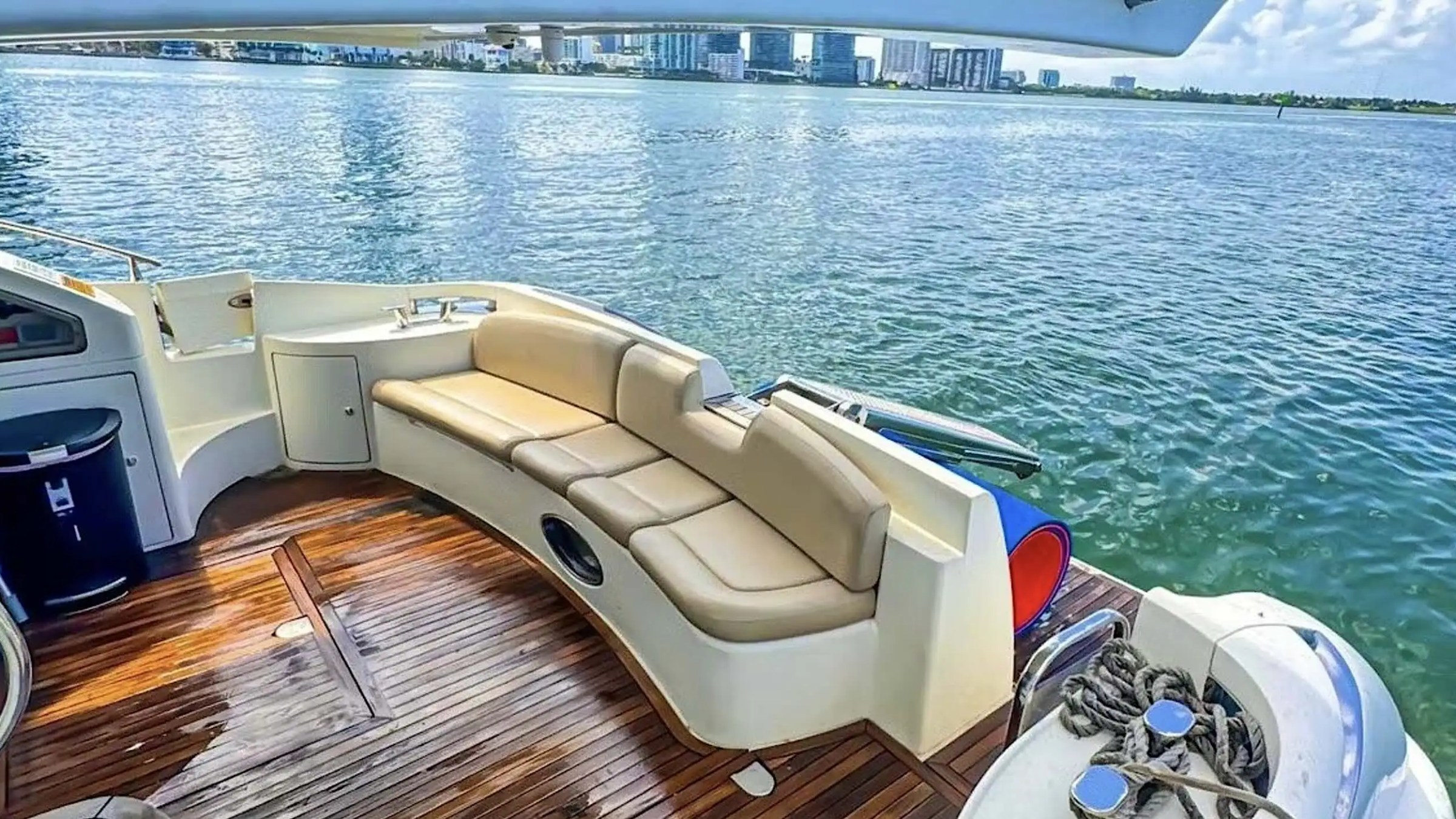 Aft lounge cushions and teak on 53′ Azimut