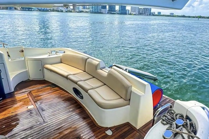 Aft lounge cushions and teak on 53′ Azimut
