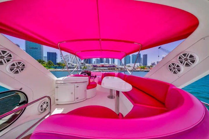 Flybridge lounge of 55′ Azimut yacht underway