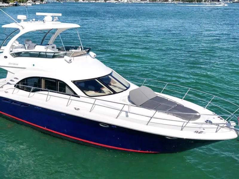 56′ SeaRay yacht drone shot anchored near shore