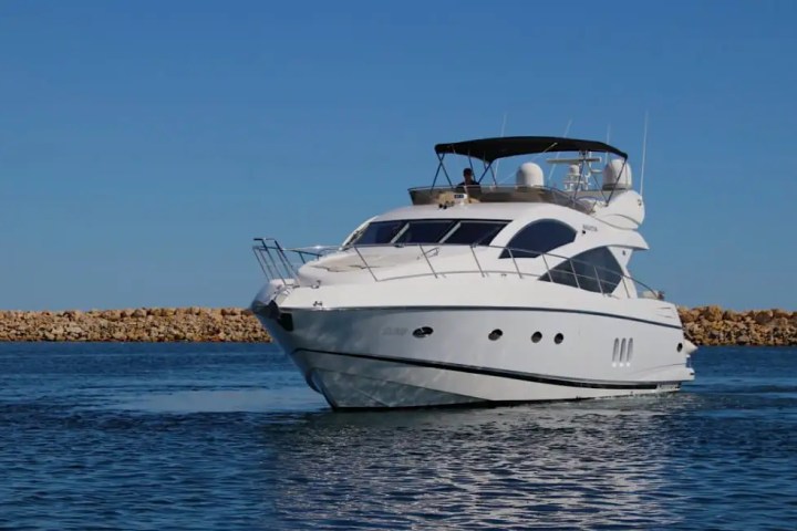 Bow view toward Miami coastline on 60′ Sunseeker Miami