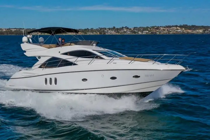 Side profile underway on 60′ Sunseeker Miami