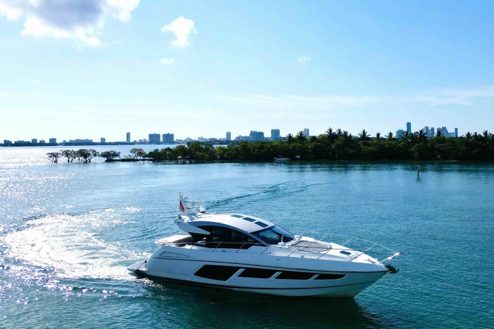 60ft Sunseeker yacht Miami cruising wake trail with guests