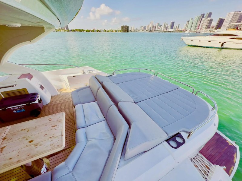 60ft Sunseeker yacht Miami stern seating with guests