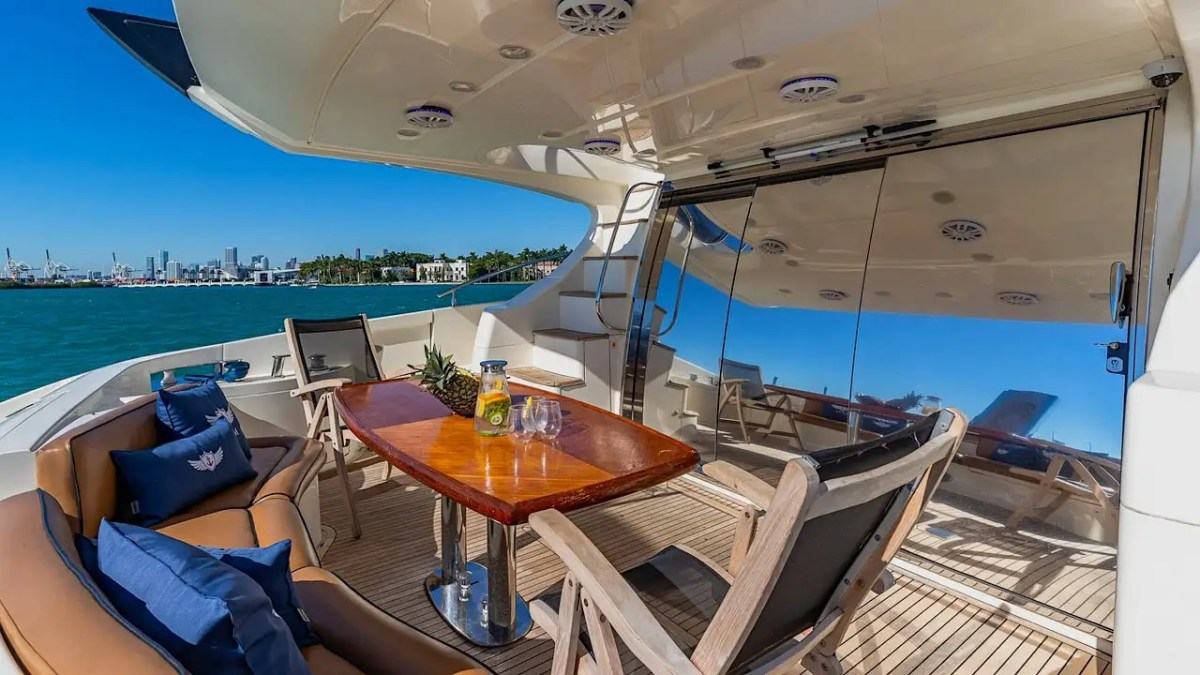 62′ Azimut 2 yacht aft deck seating and social area
