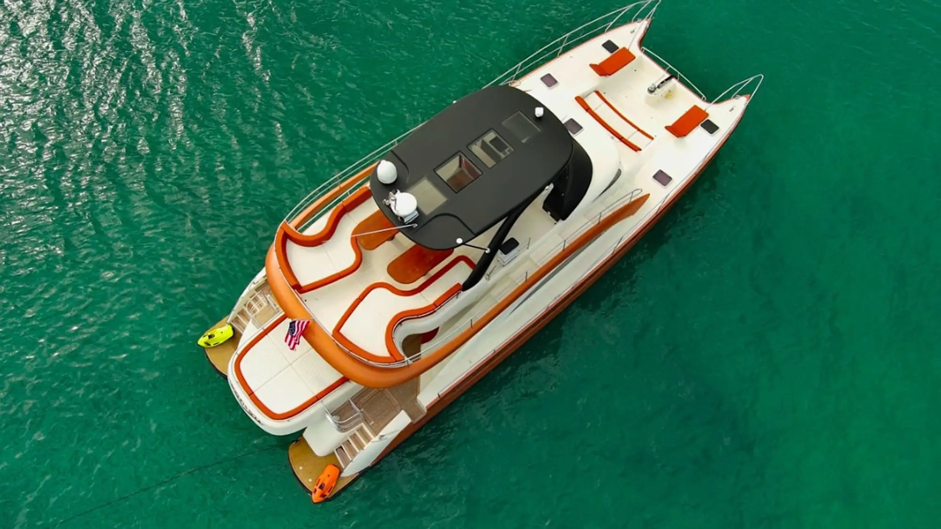 Drone orbit shot of 62′ Powercat Miami