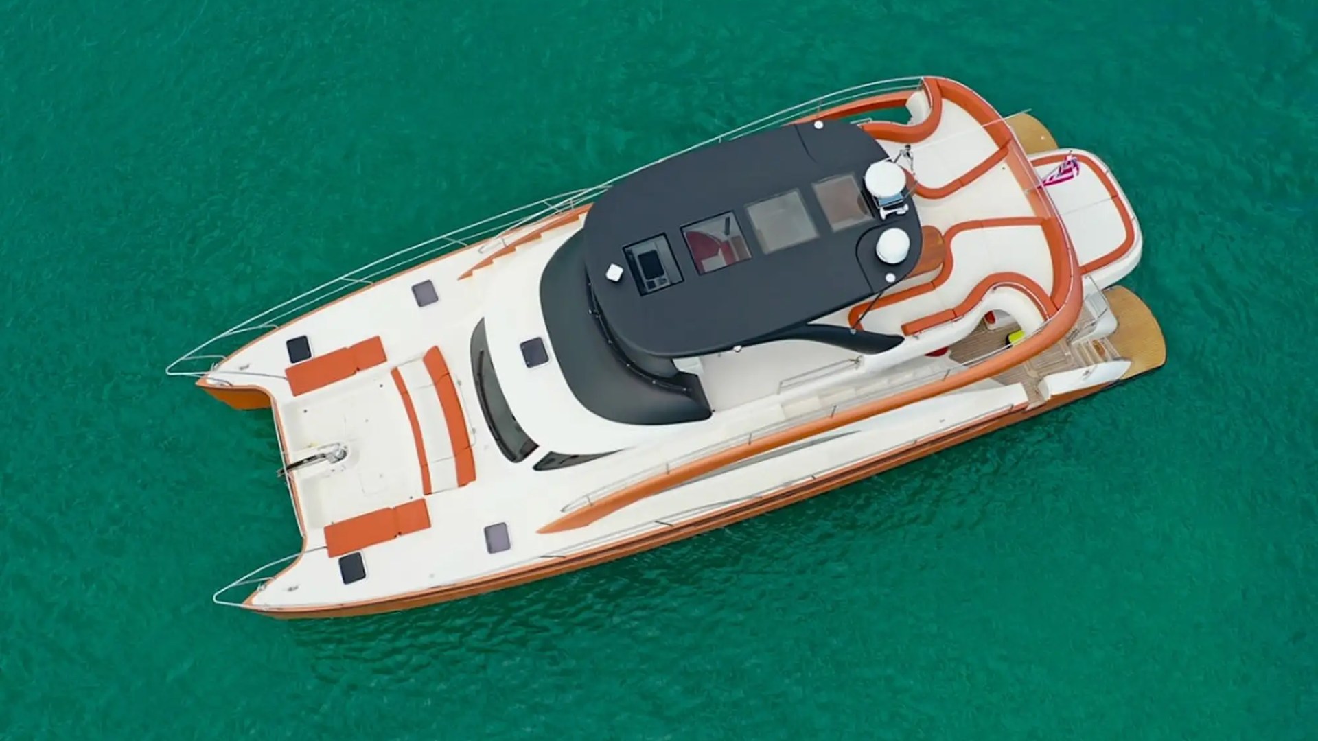 Overhead cruising aerial of 62′ Powercat Miami