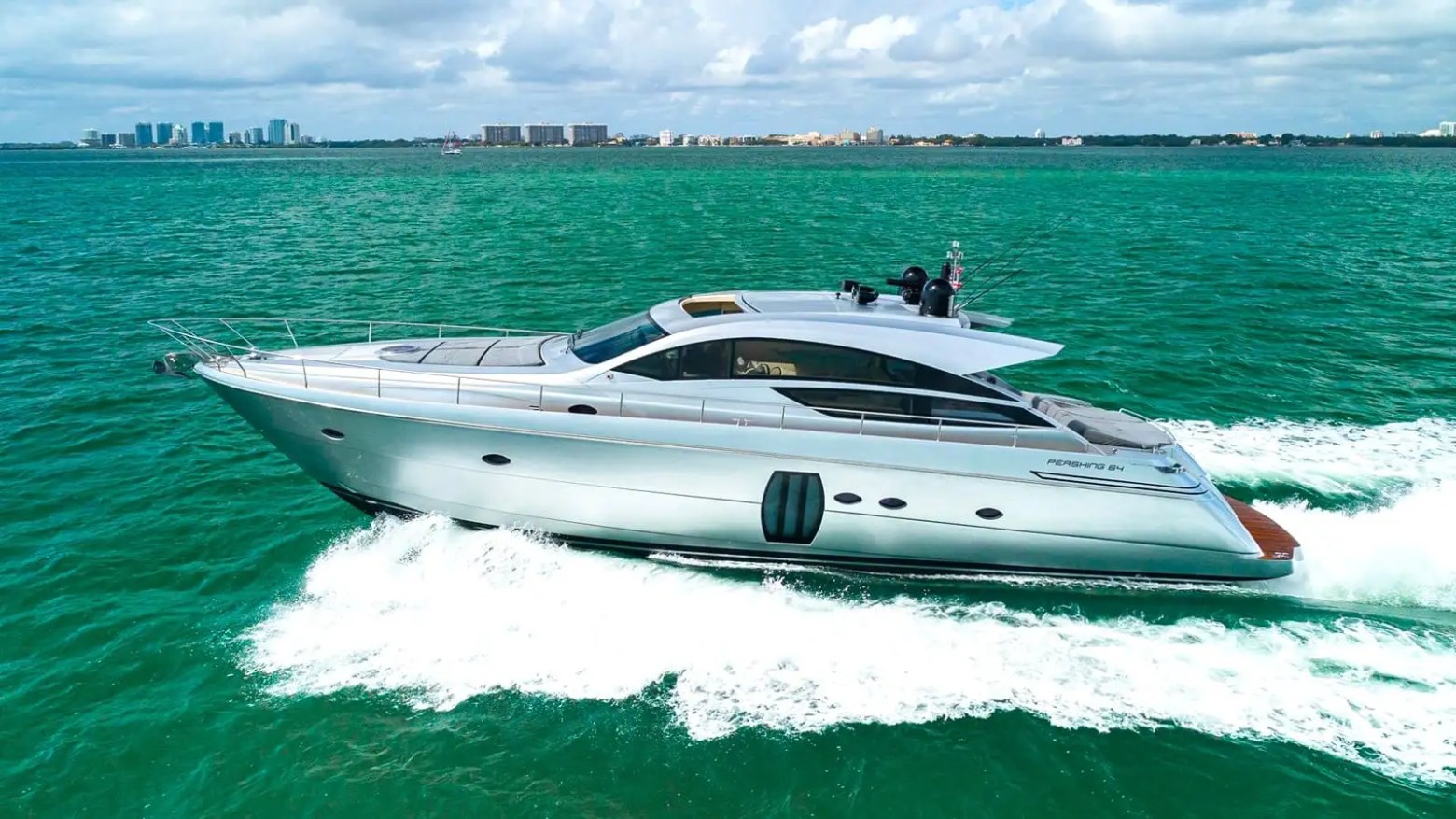 Aerial skyline & sea horizon shot of 65′ Pershing Miami
