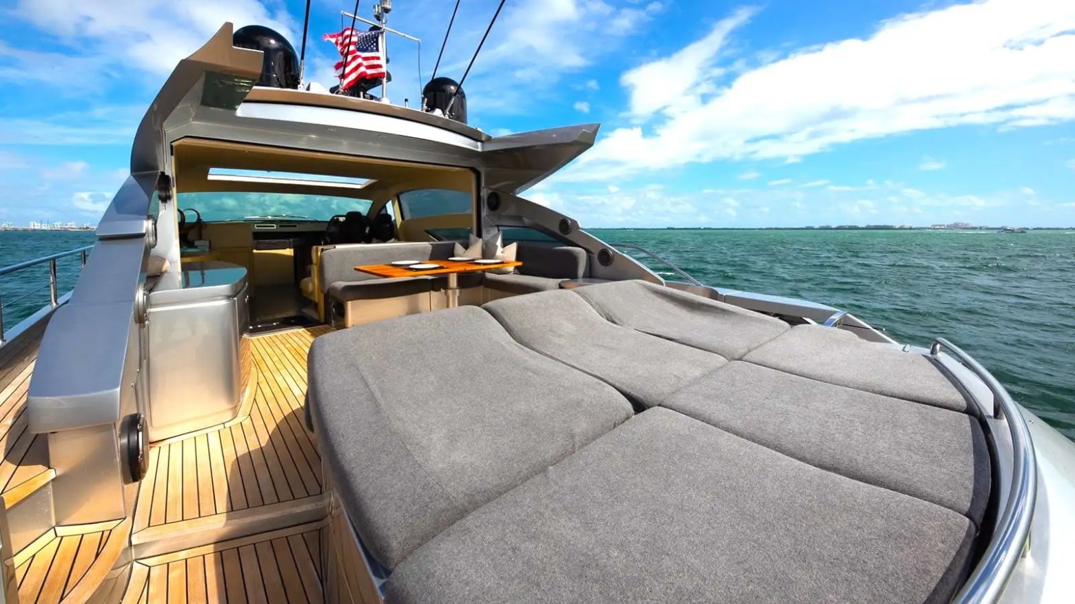 Aft deck lounge on 65′ Pershing Miami