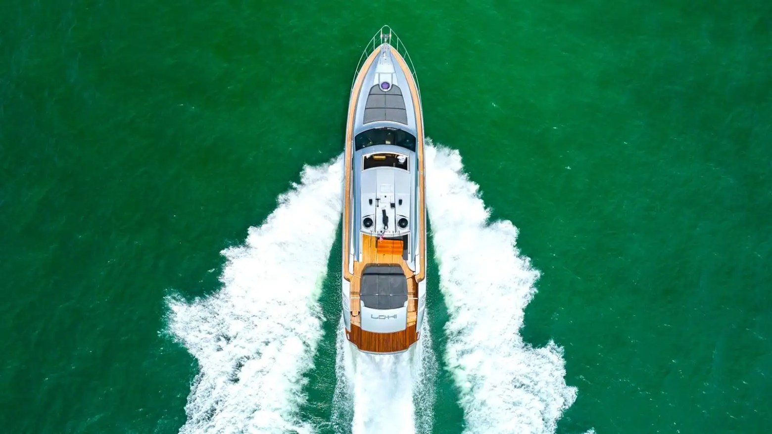 Aerial orbit shot of 65′ Pershing Miami