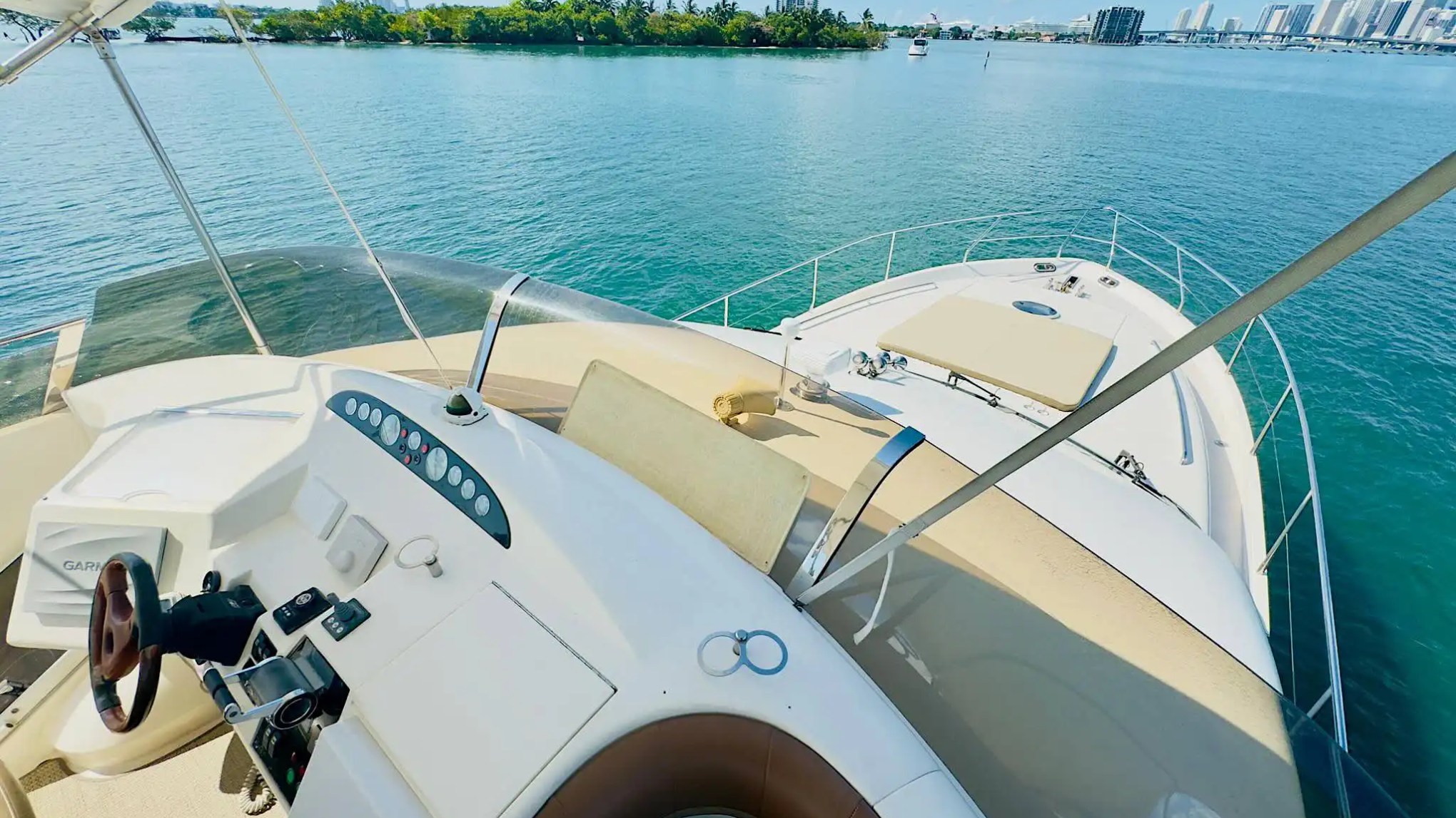 65ft Viking yacht Miami captain at exterior helm