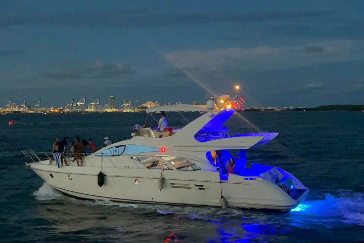 65ft Viking yacht Miami cinematic sunset return