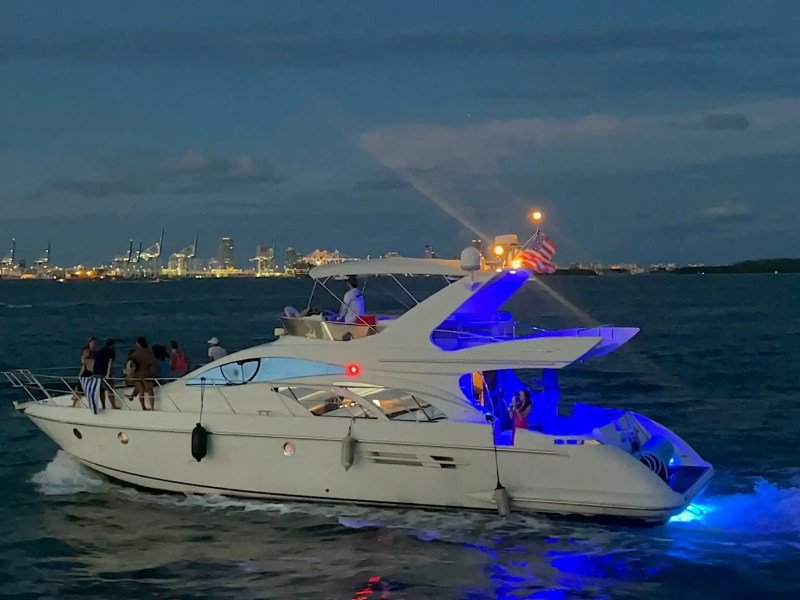 65ft Viking yacht Miami cinematic sunset return