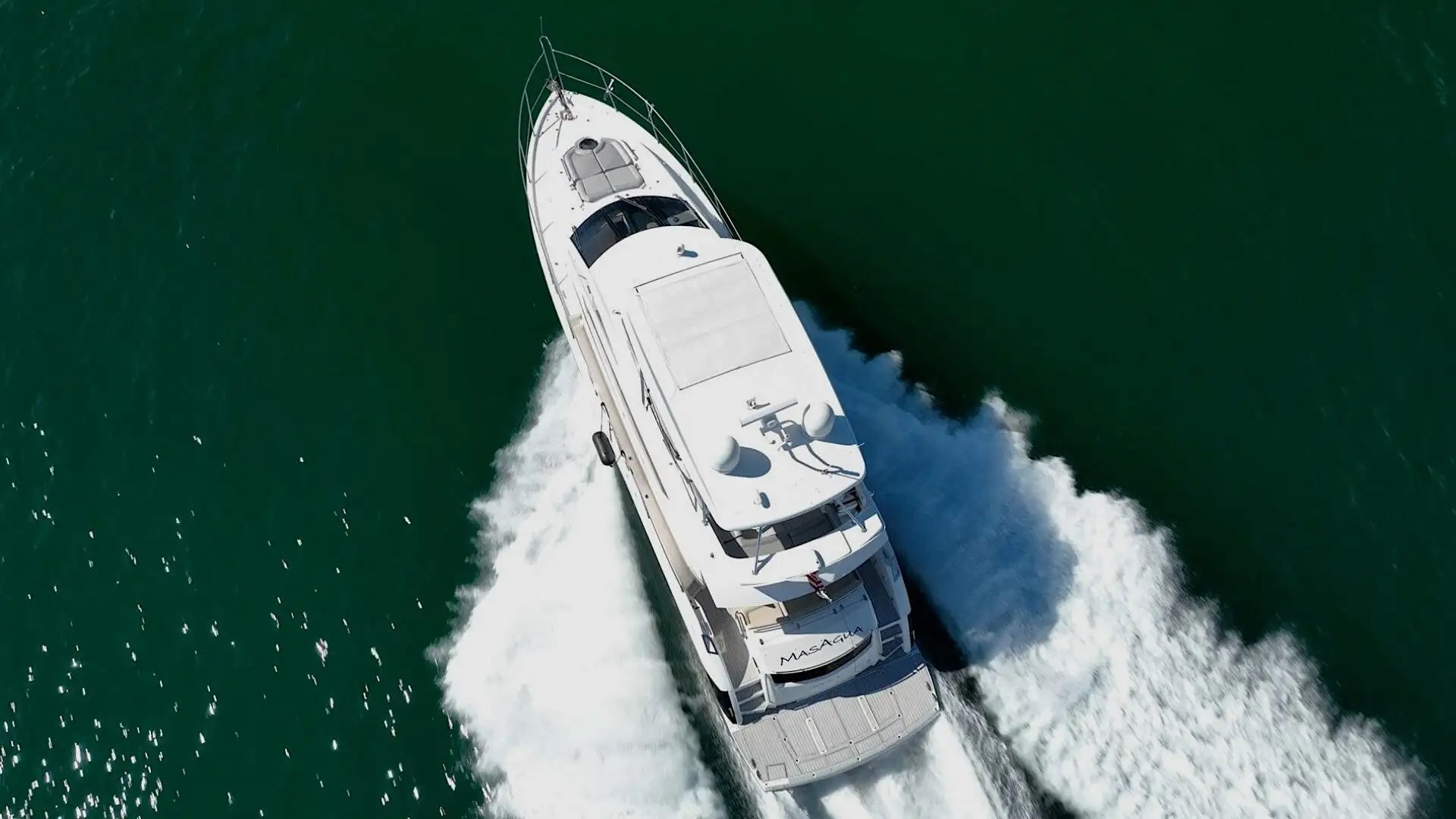 70' Sunseeker yacht charter aerial view cruising Miami Beach in Biscayne Bay