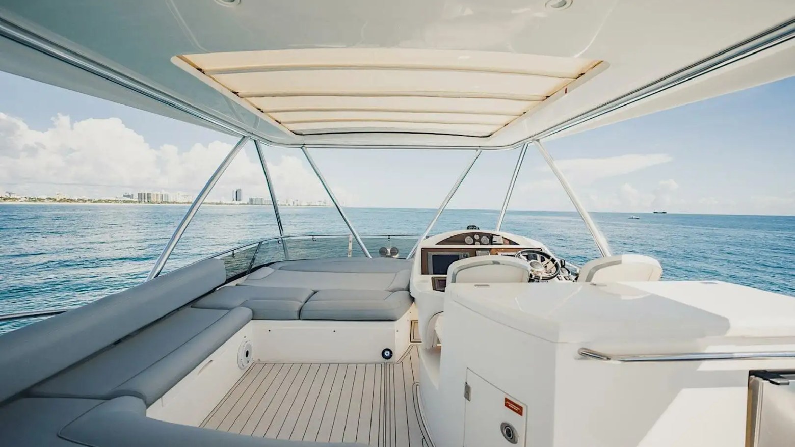 70' Sunseeker yacht charter flybridge seating in Miami Beach on Biscayne Bay