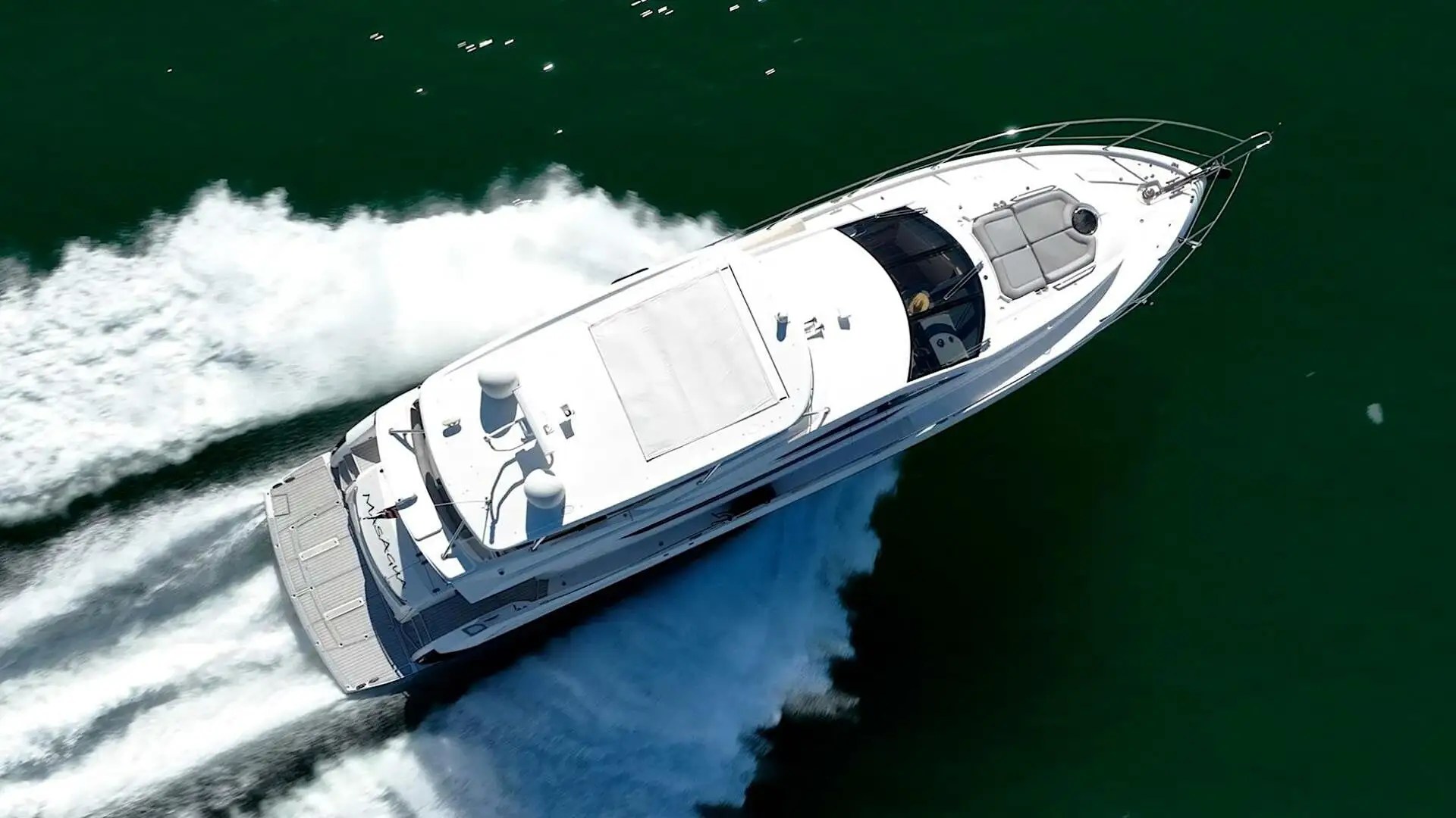 70' Sunseeker yacht charter aerial view cruising Miami Beach in Biscayne Bay