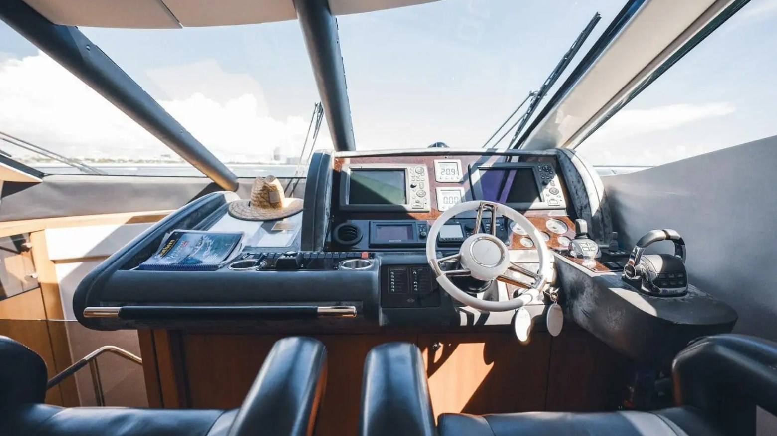 70' Sunseeker yacht charter helm station in Miami Beach on Biscayne Bay