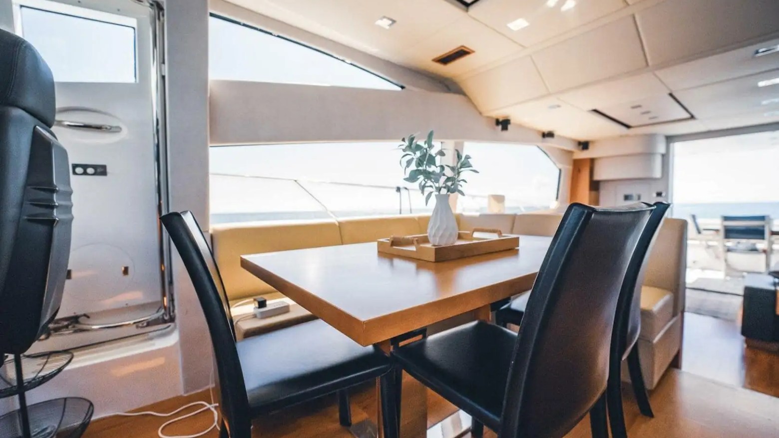 70' Sunseeker yacht charter dining area in Miami Beach on Biscayne Bay