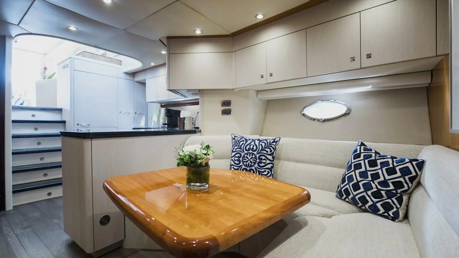 Indoor dining table on 72′ Sunseeker Miami