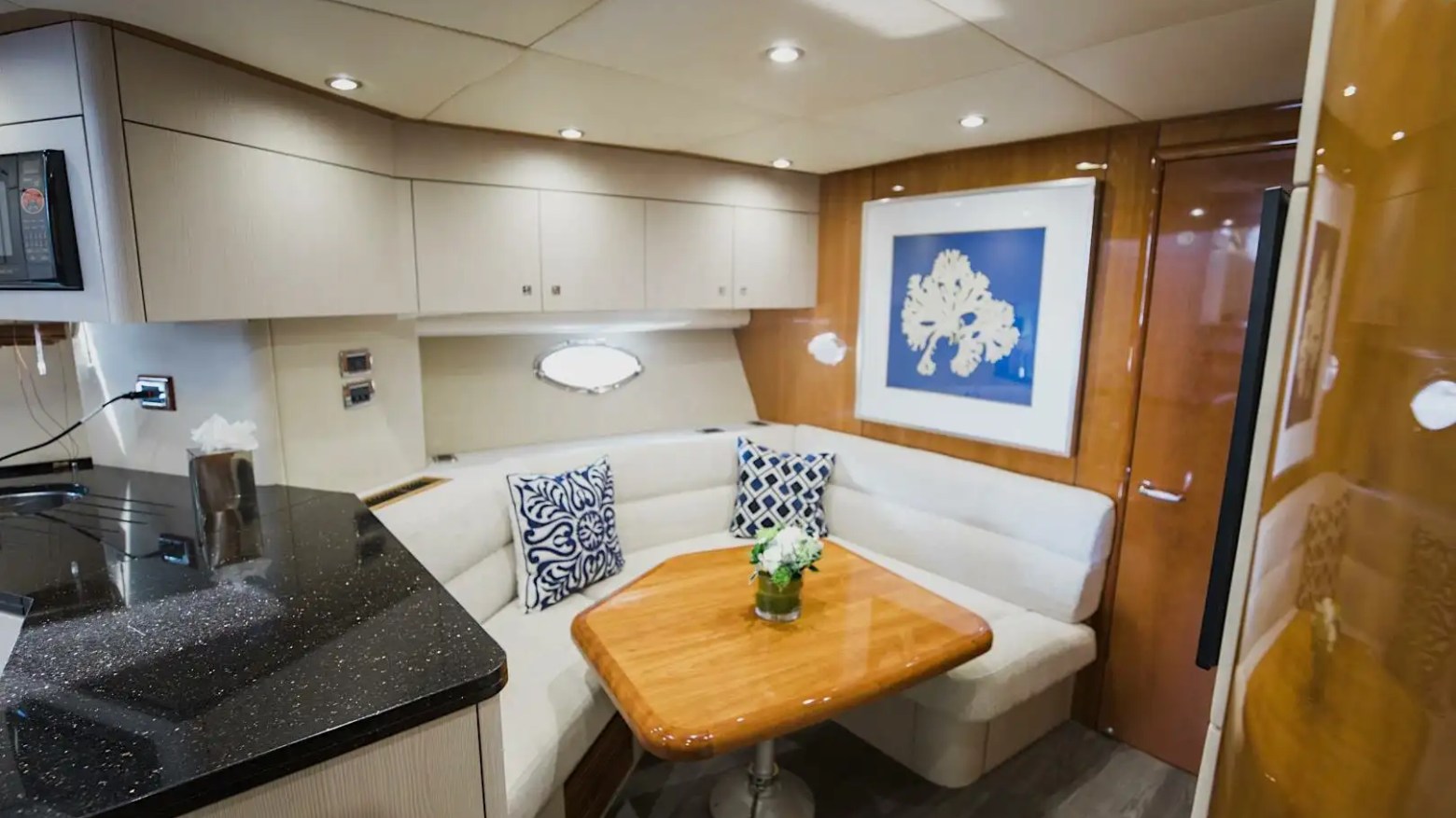 Salon + dining full-view composition on 72′ Sunseeker Miami