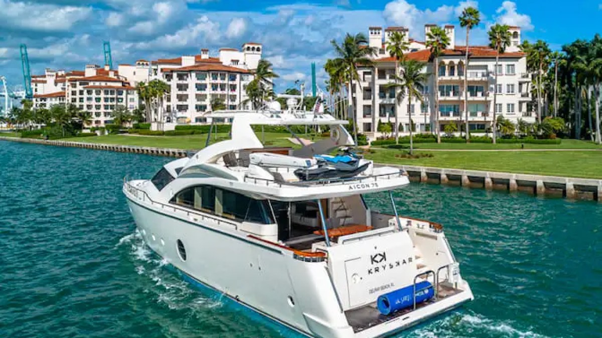 75' Aicon yacht charter cruising Miami Beach waterfront on Biscayne Bay