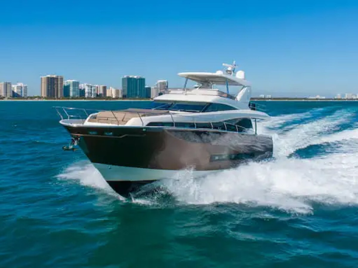 Flybridge lounge on 75′ Prestige yacht in Aventura with skyline views