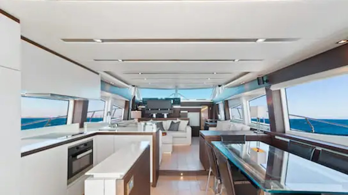 Breakfast nook or small table inside 75′ Prestige yacht