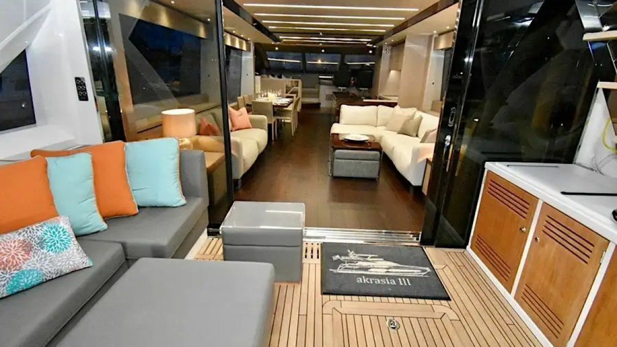 78' Sunseeker yacht charter aft cockpit lounge Miami Beach evening interior view