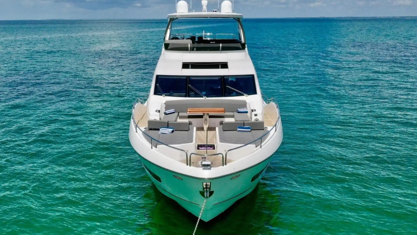 78' Sunseeker yacht charter bow view anchored in turquoise ocean near Miami Beach