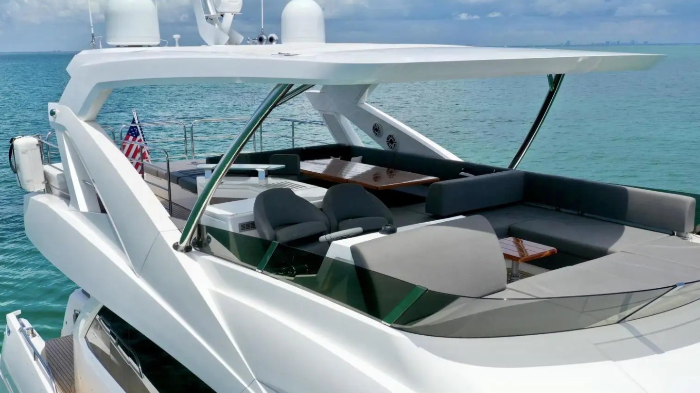 78' Sunseeker yacht charter stern view anchored Miami Beach turquoise waters