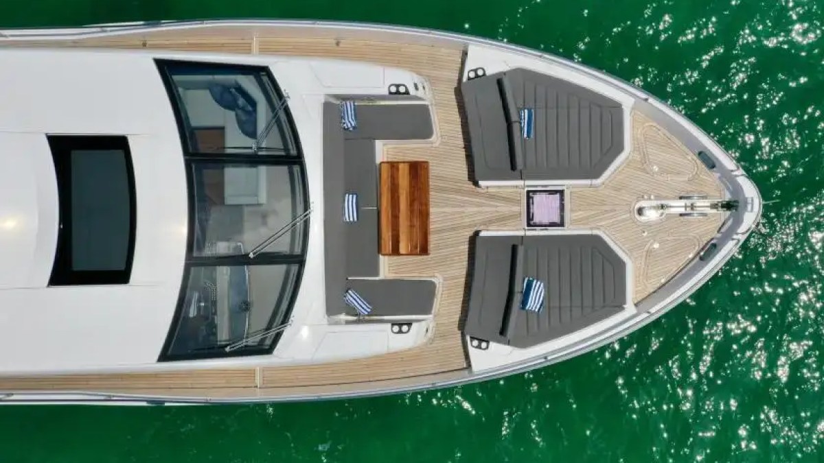 aerial drone view 78' Sunseeker yacht charter bow sunpads Miami Beach Biscayne Bay