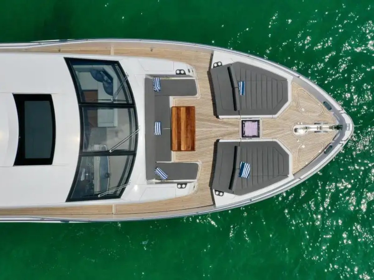 aerial drone view 78' Sunseeker yacht charter bow sunpads Miami Beach Biscayne Bay