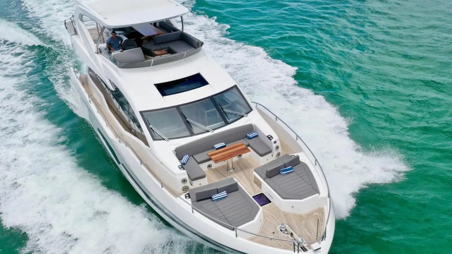 78' Sunseeker yacht charter aerial view cruising Miami Beach in turquoise ocean waters