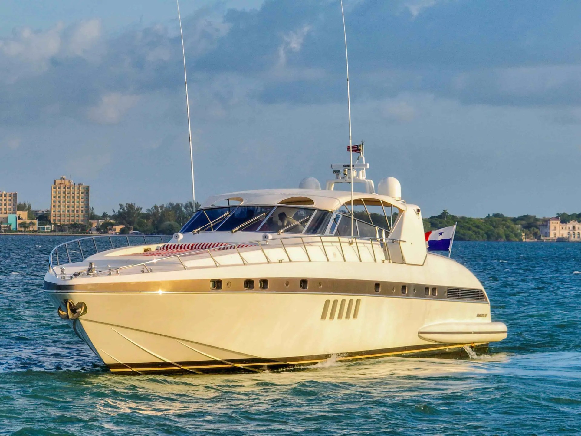 84' Mangusta yacht charter cruising Miami Beach Biscayne Bay skyline