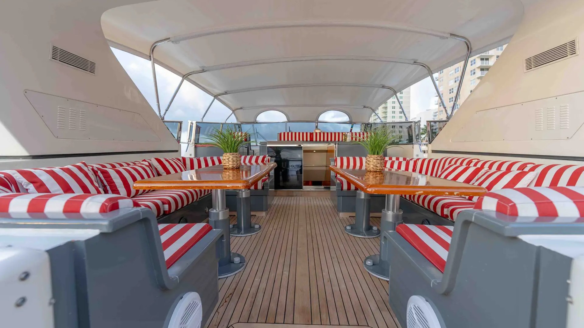 84' Mangusta yacht charter aft deck seating Miami Beach