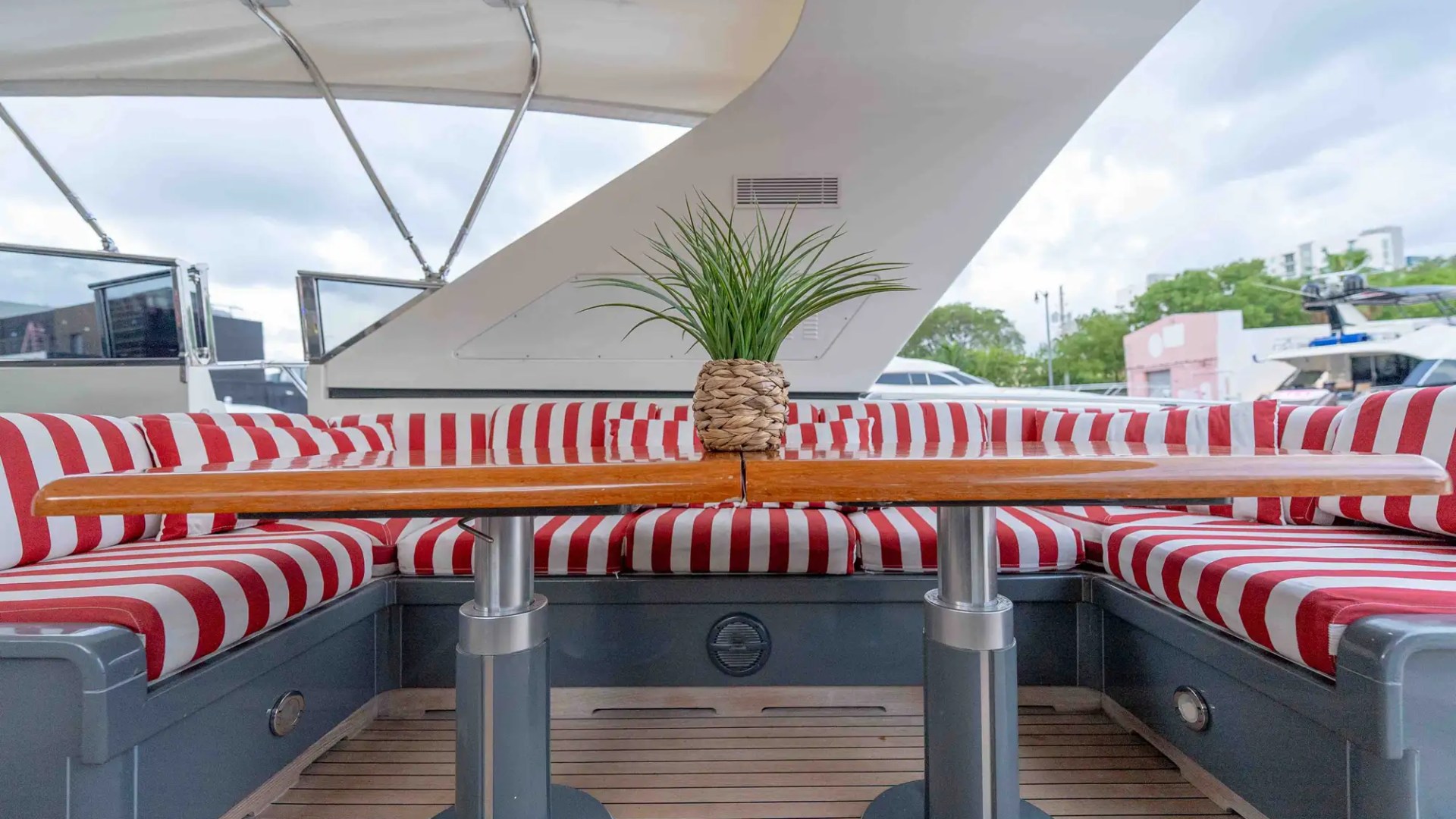 84' Mangusta yacht charter outdoor dining seating Miami Beach