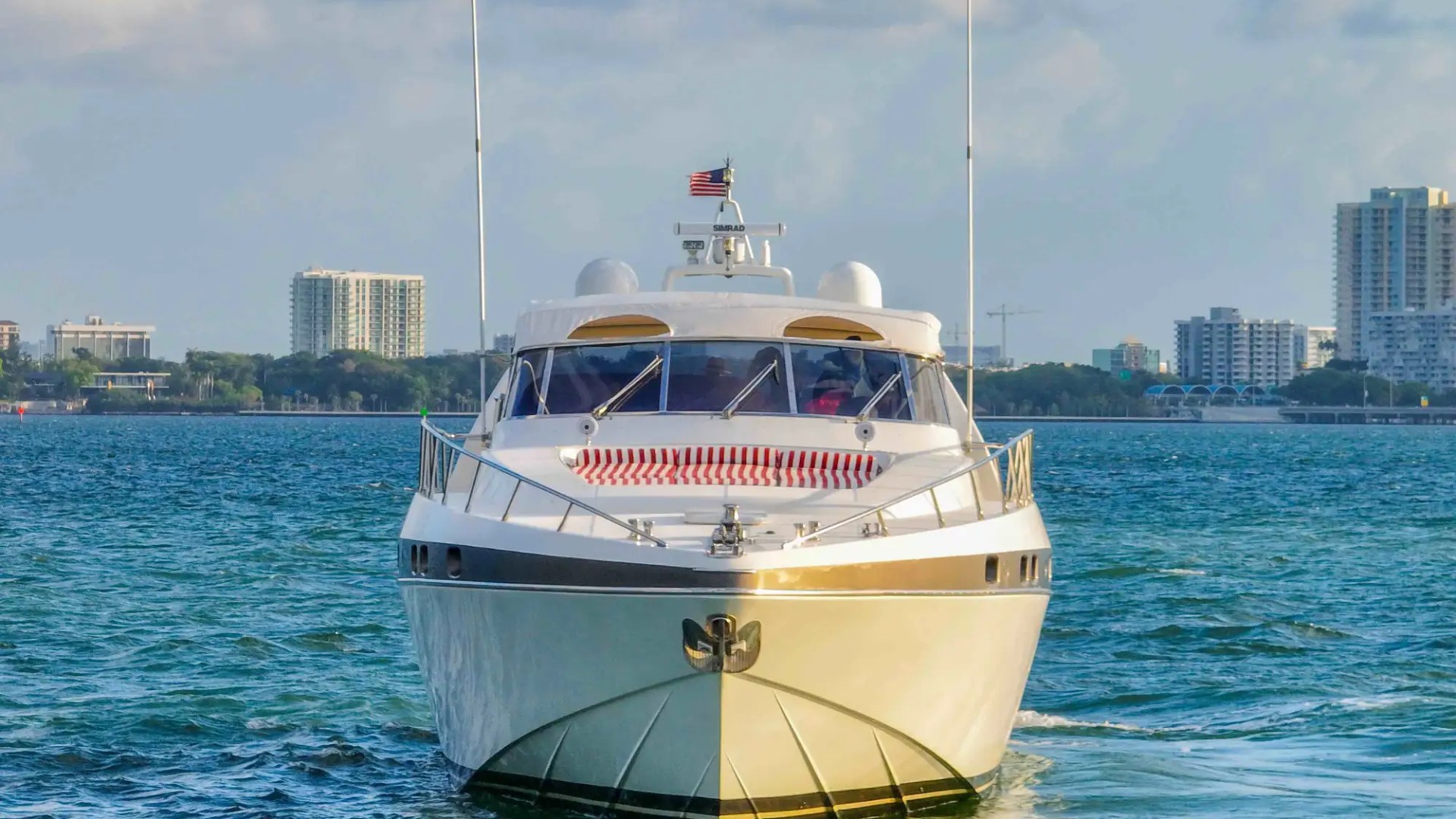 84' Mangusta yacht charter bow view Miami Beach Biscayne Bay skyline