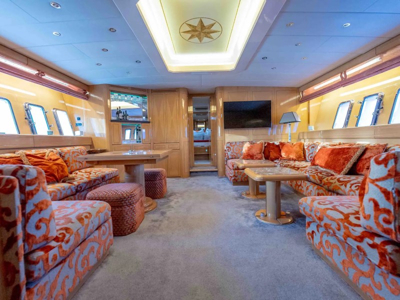 84' Mangusta yacht charter luxury salon interior Miami Beach