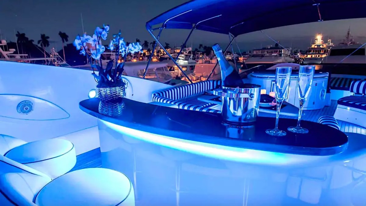 84' Sunseeker yacht charter flybridge bar at night Miami Beach marina
