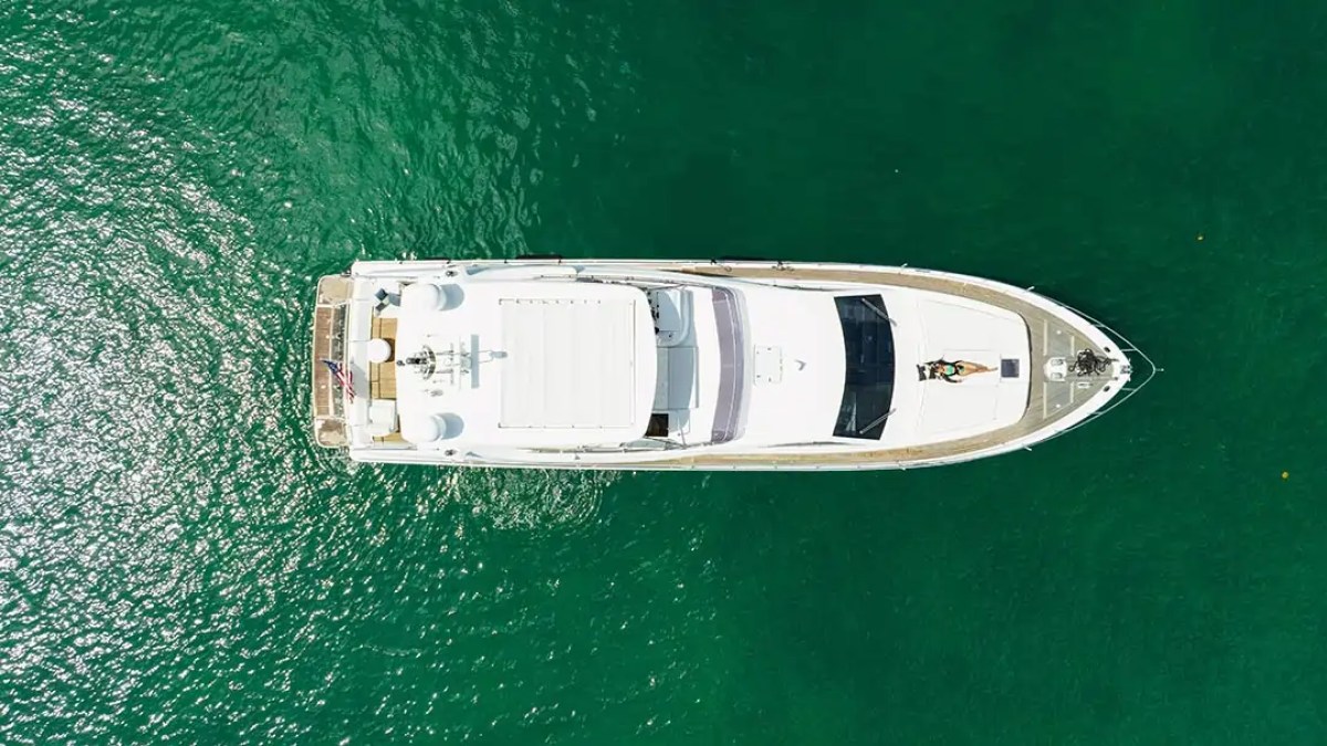 78' Ferretti yacht charter aerial top down view anchored in Miami Beach waters