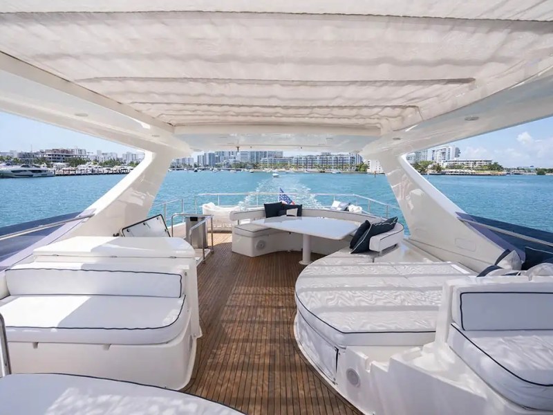 78' Ferretti yacht charter flybridge lounge seating cruising Miami Beach in Biscayne Bay
