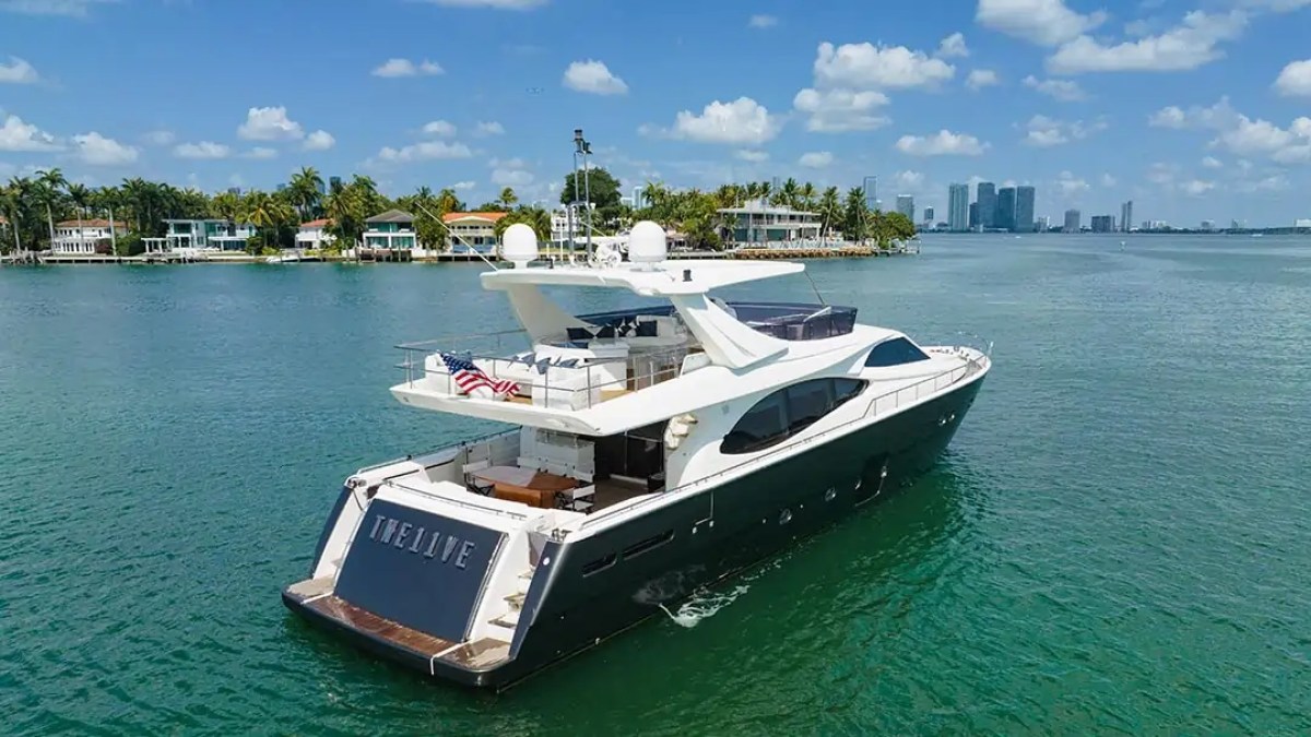 78' Ferretti yacht charter cruising Biscayne Bay near Miami Beach skyline