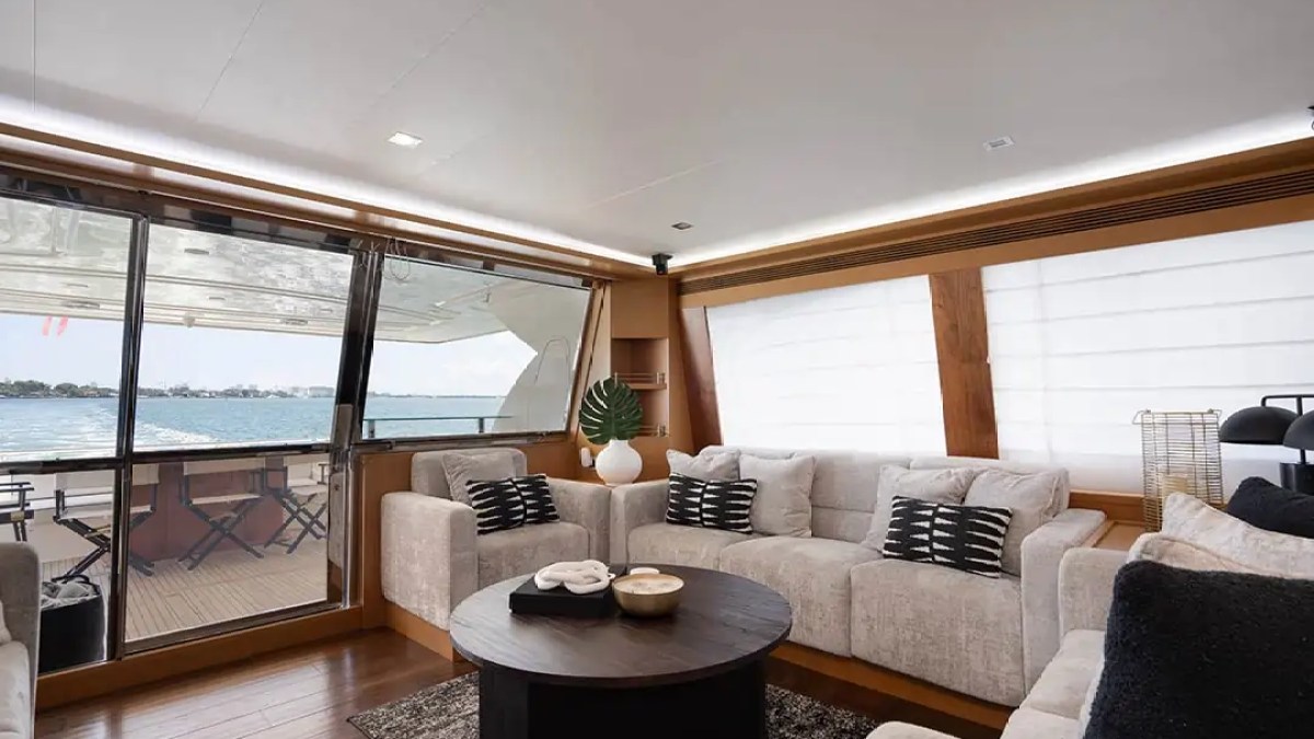 78' Ferretti yacht charter luxury salon lounge seating with ocean views in Miami Beach