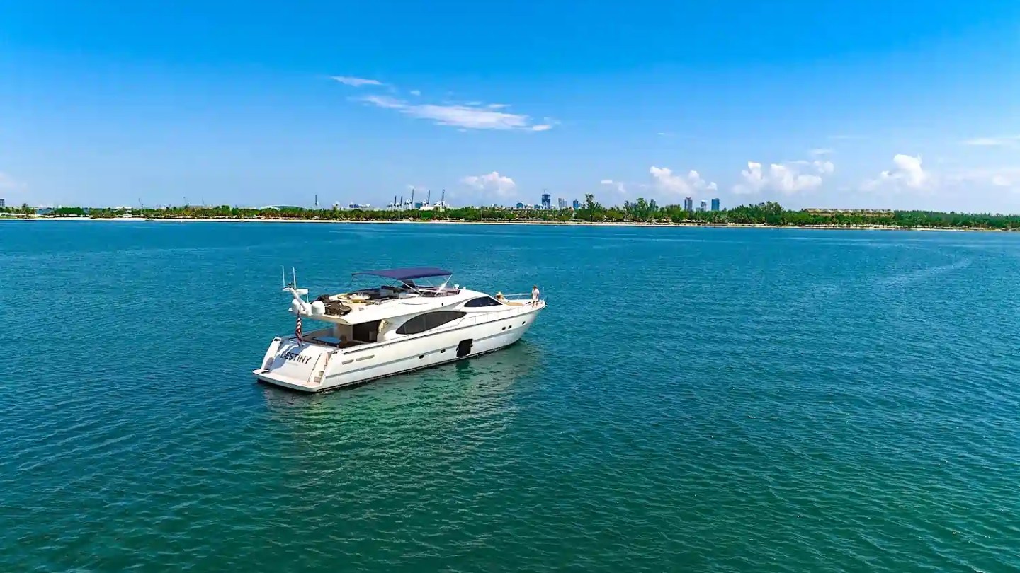 Aerial cruising pass of 80′ Ferretti Miami