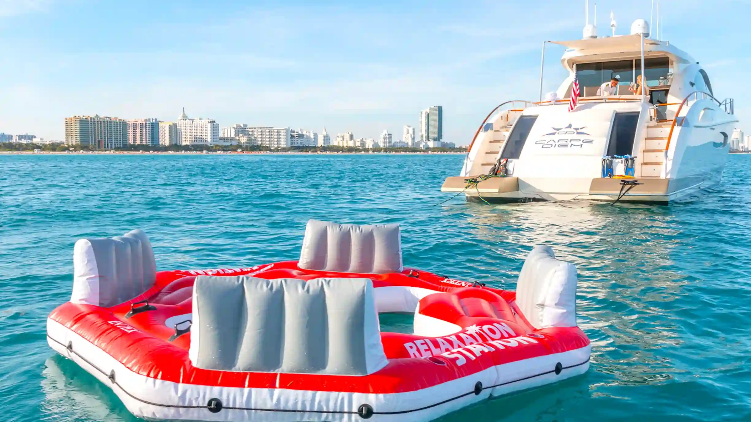 75' Lazzara yacht charter floating lounge platform Miami Beach Biscayne Bay