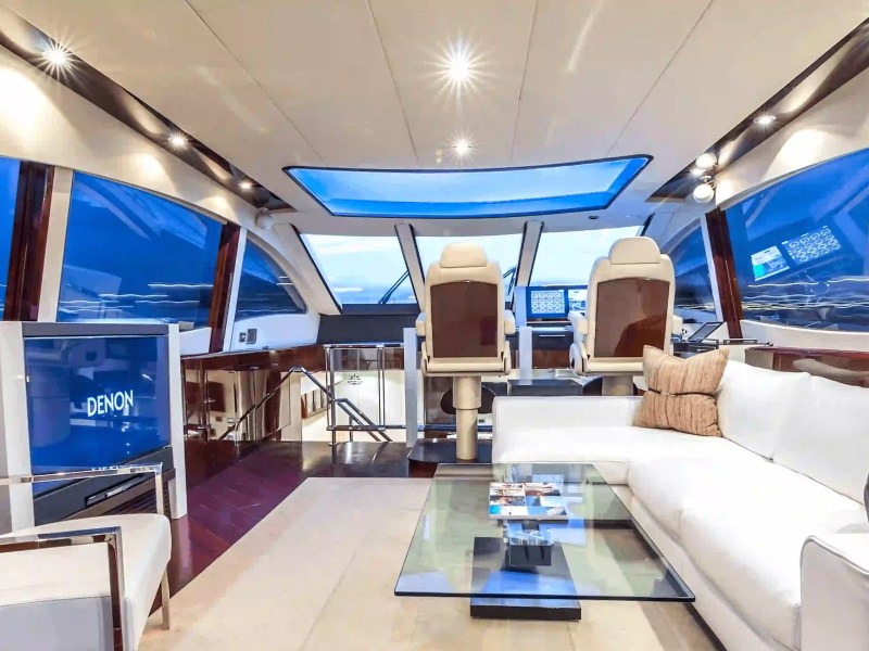 75' Lazzara yacht charter luxury salon and helm interior Miami Beach yacht rental