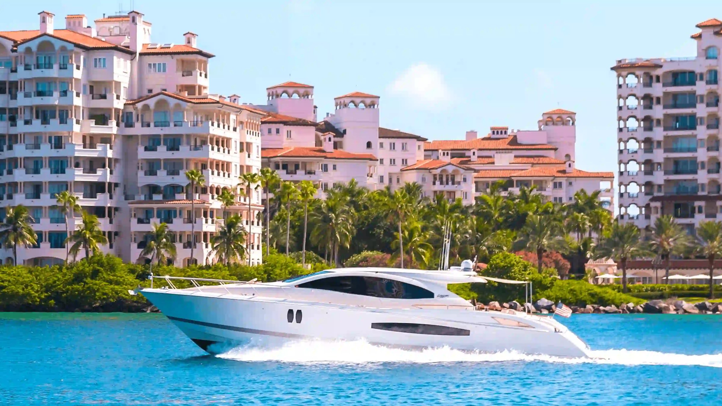 75' Lazzara yacht charter cruising Miami Beach waterfront near luxury condos
