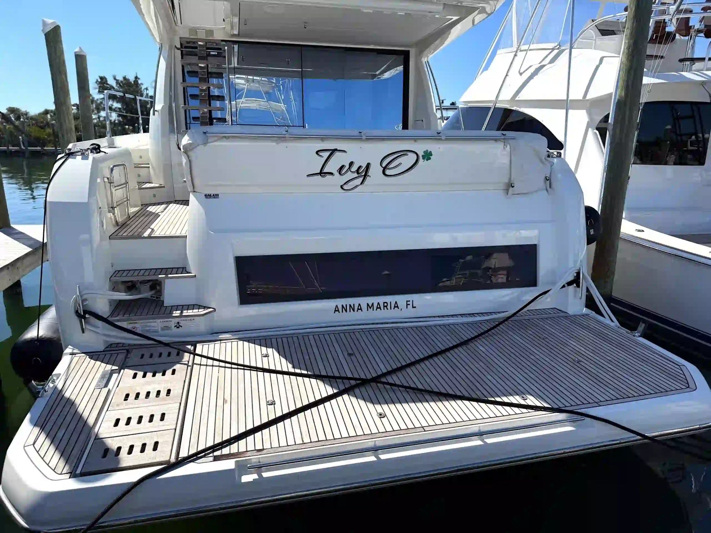 Prestige 59 yacht charter Anna Maria swim platform stern deck view